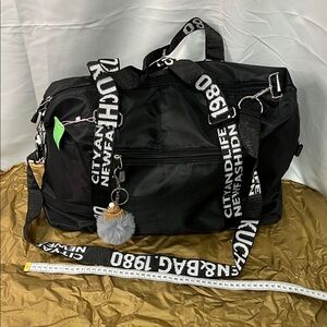 Black Duffel Bag with White Lettering